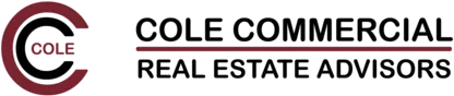 A black and white image of the words " cole commercial real estate ".